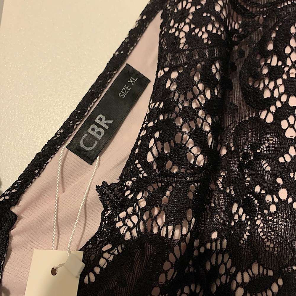I am selling a sleeveless dress. Never worn.